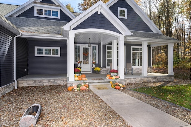 doorway to property with covered porch