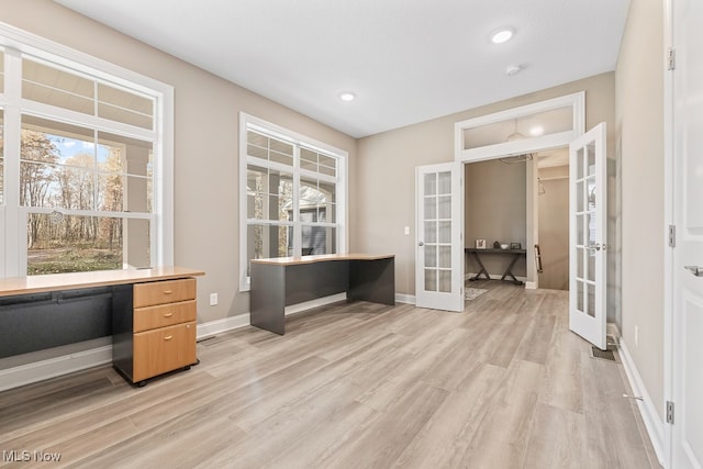 office area featuring light wood-type flooring and french doors