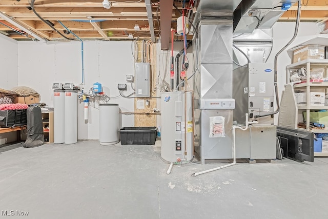 utility room with electric panel, water heater, and heating unit