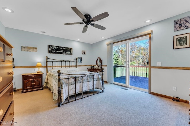 bedroom with ceiling fan, light carpet, and access to outside