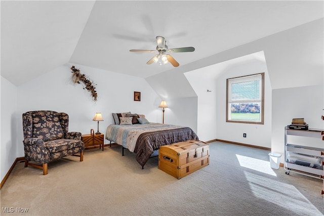 carpeted bedroom with ceiling fan and lofted ceiling