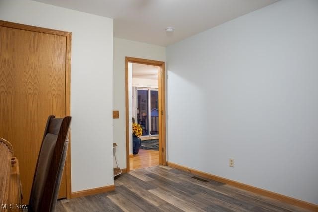 office area with dark wood-type flooring