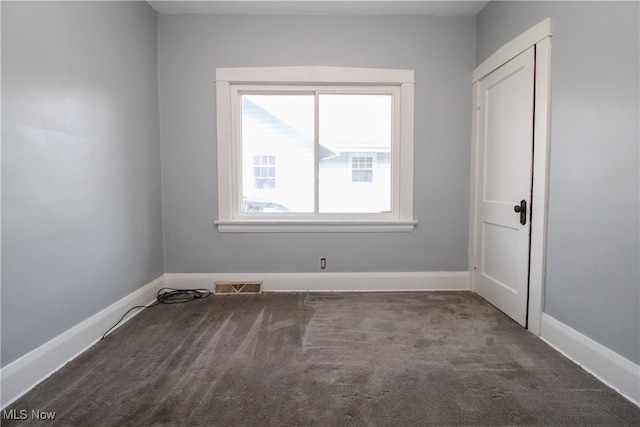 view of carpeted spare room