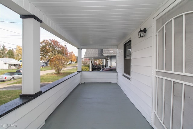 balcony featuring a porch