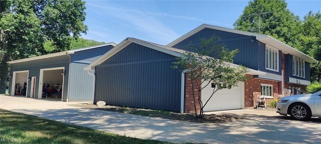 view of property exterior featuring a garage