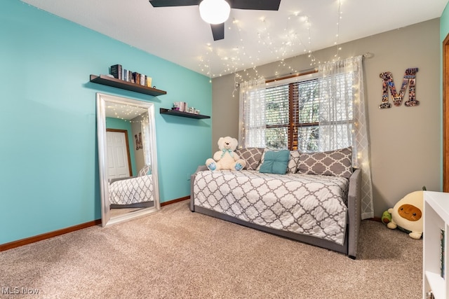 bedroom featuring ceiling fan and carpet floors