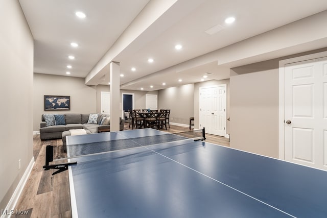 playroom with light hardwood / wood-style flooring