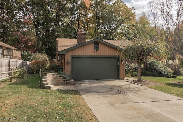 garage with a lawn