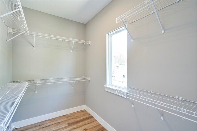 V/L E 344th St, Eastlake, OH 44095 - walk in closet featuring wood finished floors