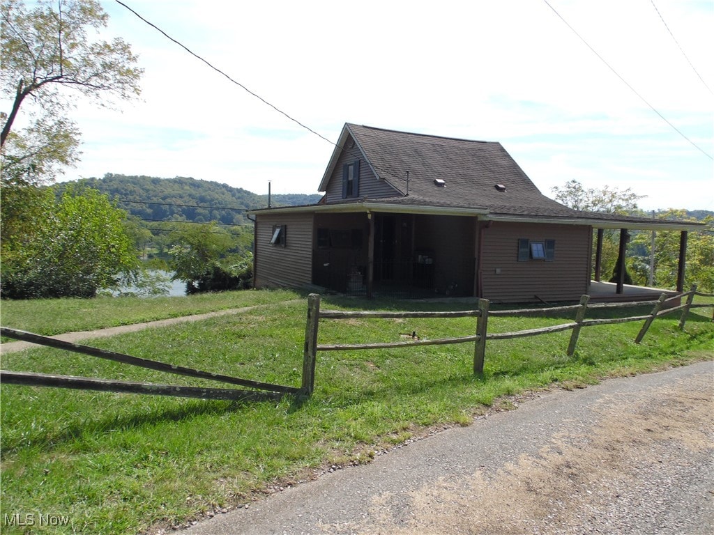 view of home's exterior featuring a yard