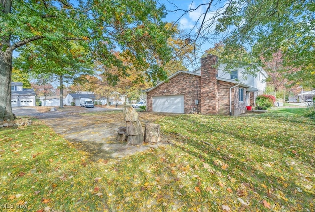 view of yard with a garage