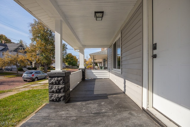 view of patio featuring covered porch