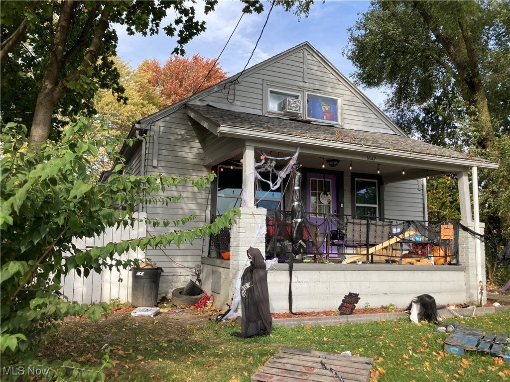 bungalow-style home with a porch