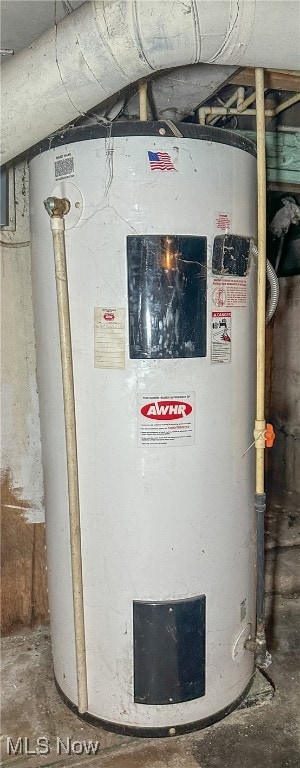 utility room featuring electric water heater