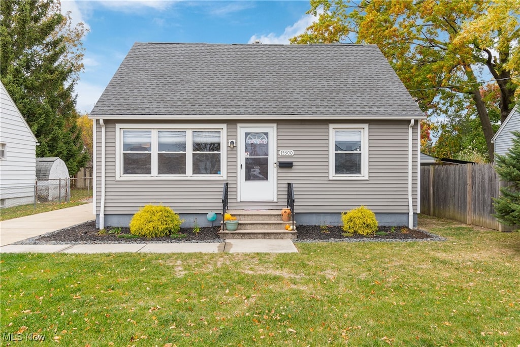 bungalow with a front yard