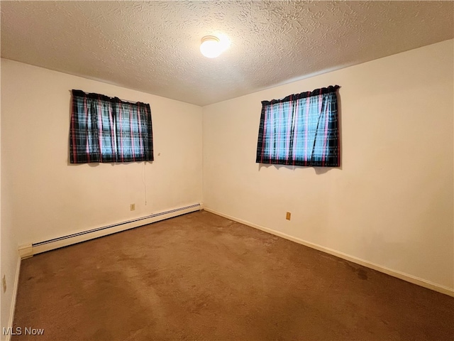 unfurnished room with a baseboard radiator, a textured ceiling, and carpet floors