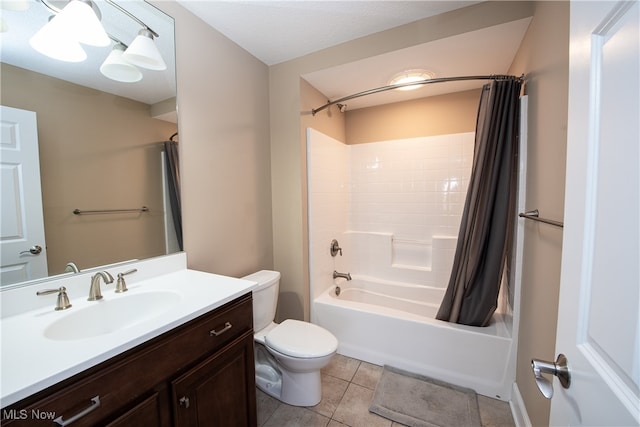 full bathroom featuring a textured ceiling, shower / bathtub combination with curtain, toilet, vanity, and tile patterned floors