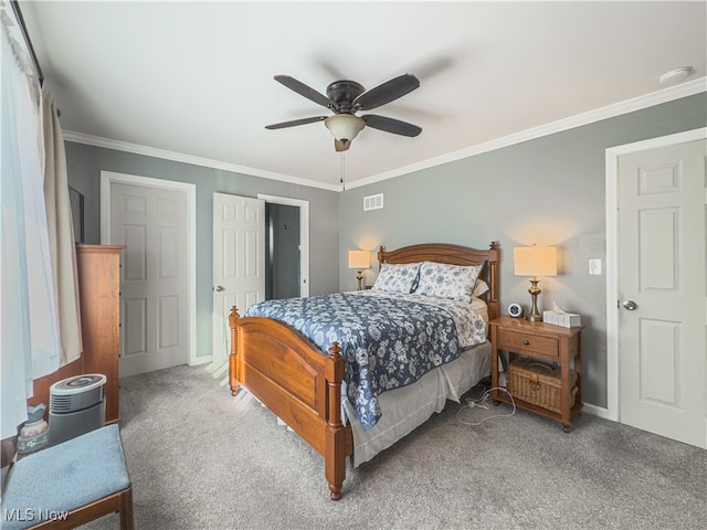 bedroom featuring carpet flooring, ceiling fan, and ornamental molding