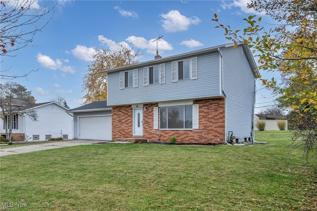 view of property featuring a front lawn and a garage