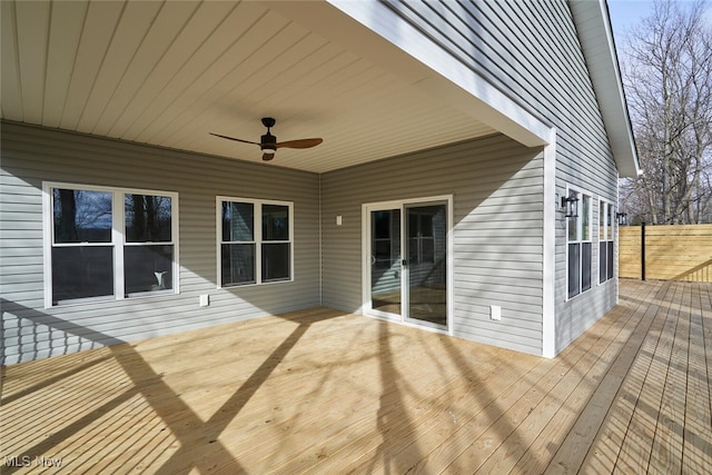 wooden terrace featuring ceiling fan