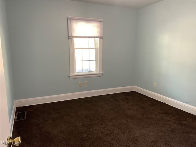 unfurnished room featuring carpet floors