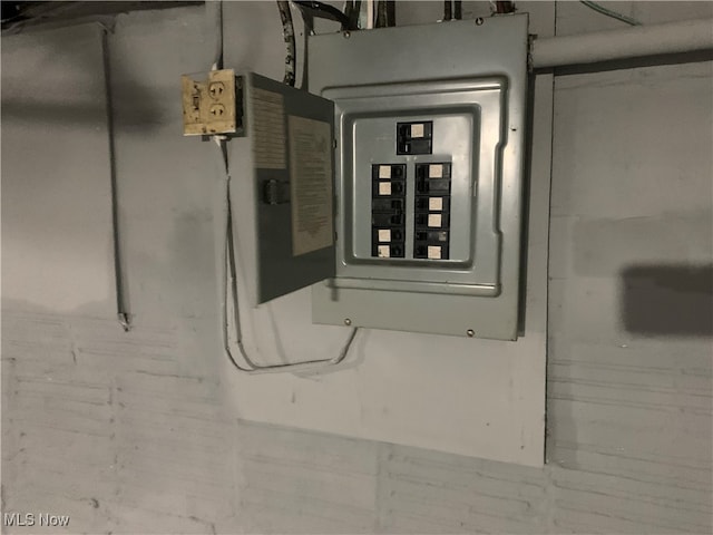 utility room featuring electric panel