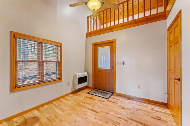 33352 Teegarden Rd Unit 787, Lisbon, OH 44432 - foyer featuring heating unit, light wood-style flooring, ceiling fan, and a high ceiling