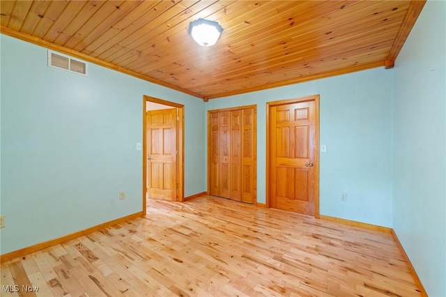 33352 Teegarden Rd Unit 787, Lisbon, OH 44432 - unfurnished bedroom featuring ornamental molding, wood finished floors, wood ceiling, and a closet