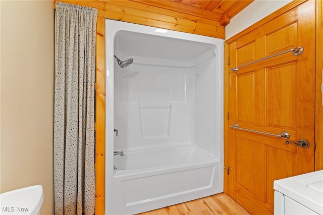 bathroom featuring vanity, wood ceiling, hardwood / wood-style flooring, and tub / shower combination