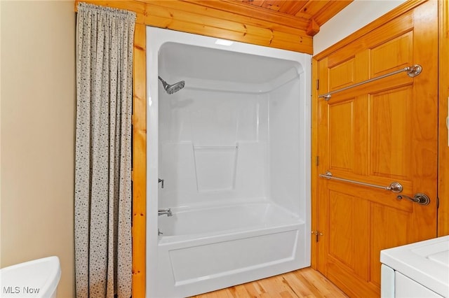 33352 Teegarden Rd Unit 787, Lisbon, OH 44432 - bathroom with shower / bath combination with curtain and wood finished floors