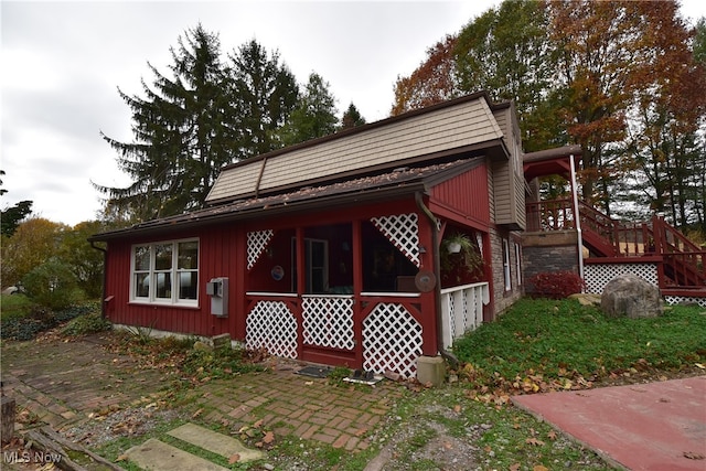 view of home's exterior with a deck