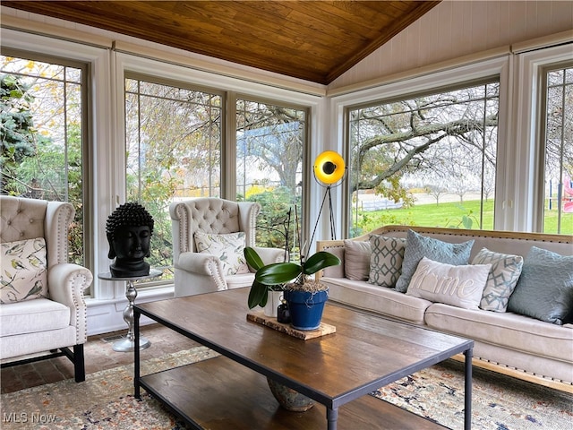 sunroom with wooden ceiling, plenty of natural light, and lofted ceiling