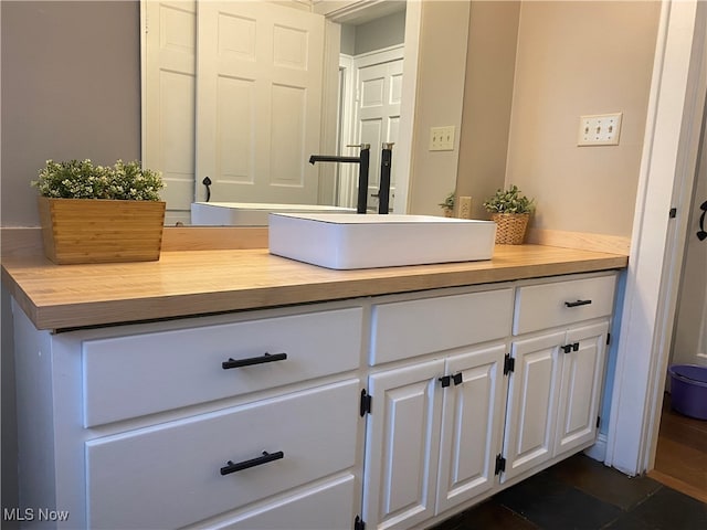 bathroom featuring vanity and tile patterned floors