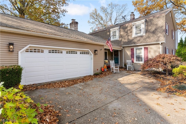 view of front of home featuring a garage