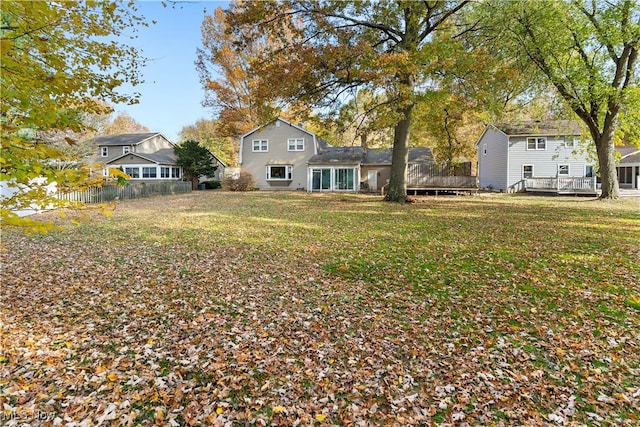 view of yard with a wooden deck