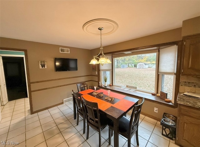 view of tiled dining area