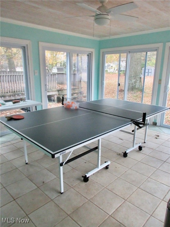 game room with light tile patterned floors and ceiling fan