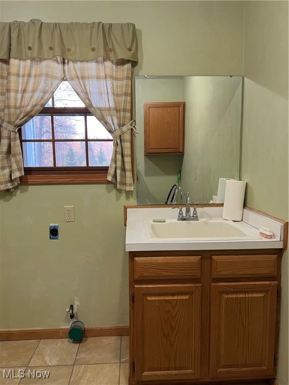 bathroom featuring vanity and tile patterned floors