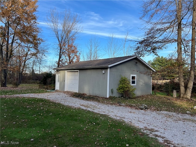 garage with a lawn