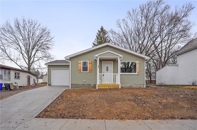 bungalow featuring a garage