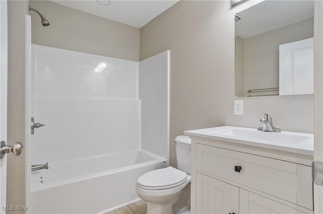 full bathroom with vanity, toilet, and bathing tub / shower combination