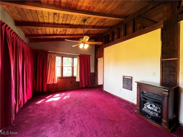 unfurnished living room featuring ceiling fan, wood ceiling, vaulted ceiling with beams, and dark carpet