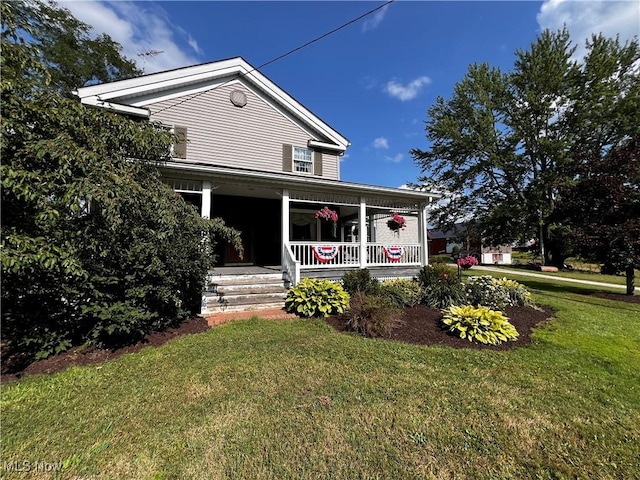 exterior space with a front yard and a porch