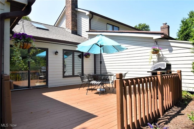 432 Chipping Ln, Chagrin Falls, OH 44023 - wooden deck with outdoor dining space