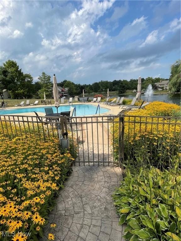 432 Chipping Ln, Chagrin Falls, OH 44023 - pool with a water view and fence