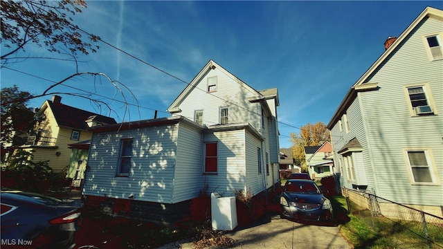 view of home's exterior featuring cooling unit