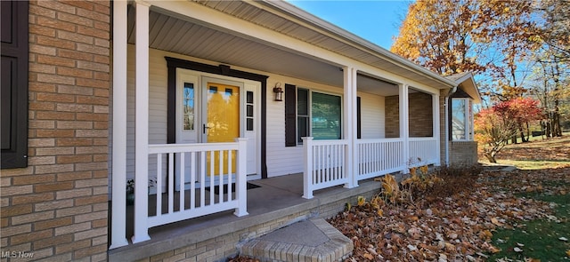 property entrance with covered porch