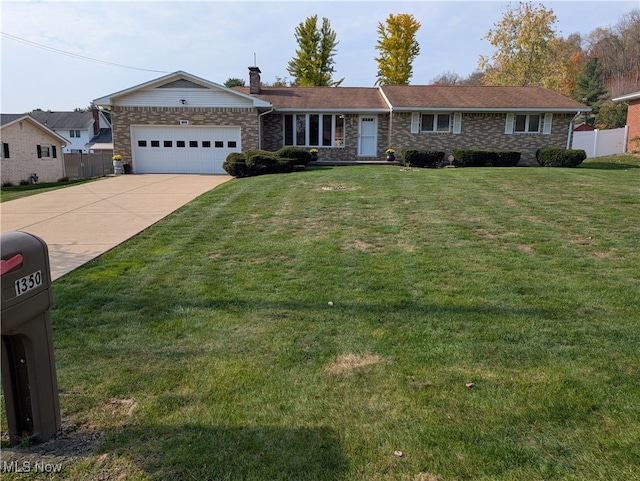 ranch-style house with a garage and a front lawn