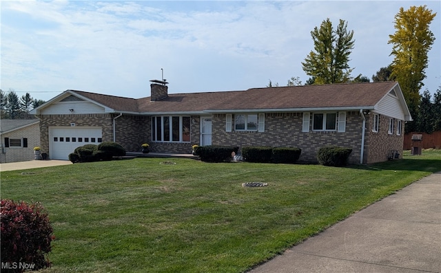 ranch-style home featuring a front yard and a garage