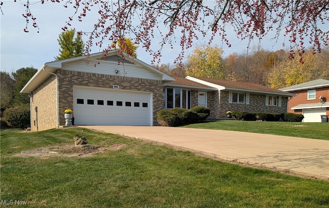 ranch-style house with a garage and a front lawn